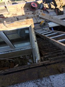 Rebuild dormer window and re-roof