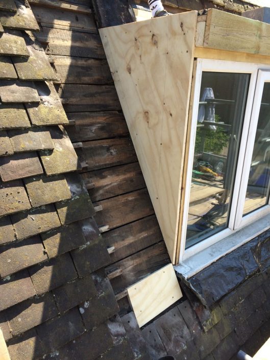 Rebuild dormer window and re-roof