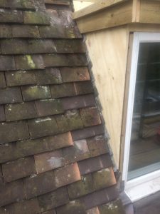 Rebuild dormer window and re-roof