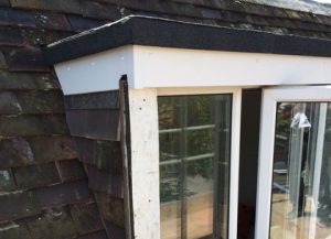 Rebuild dormer window and re-roof